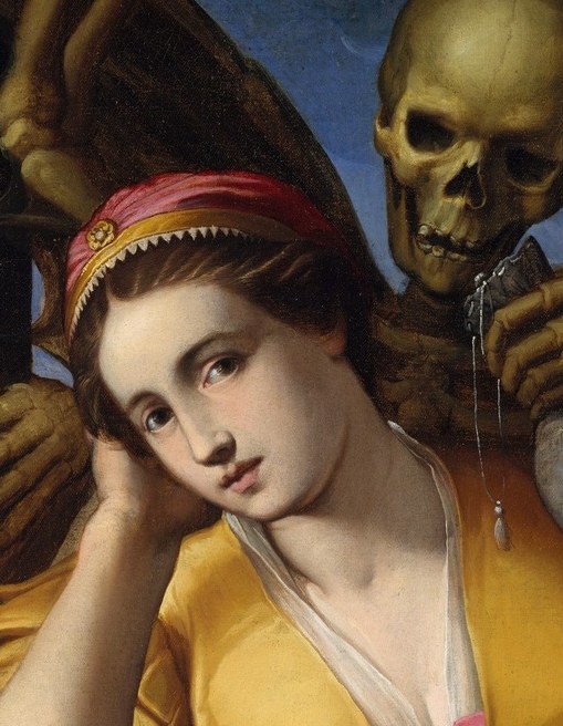She looks consumed by her own thoughts.