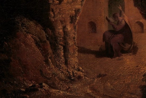 He holds a scroll. He is performing the Aeneid inside its author's tomb.