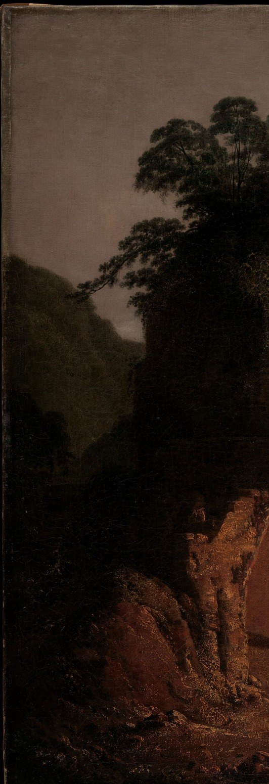 Acts as a dark stage coulisse that forces the eye toward the warm light; its geological weight and permanence implicitly compare geological and literary time