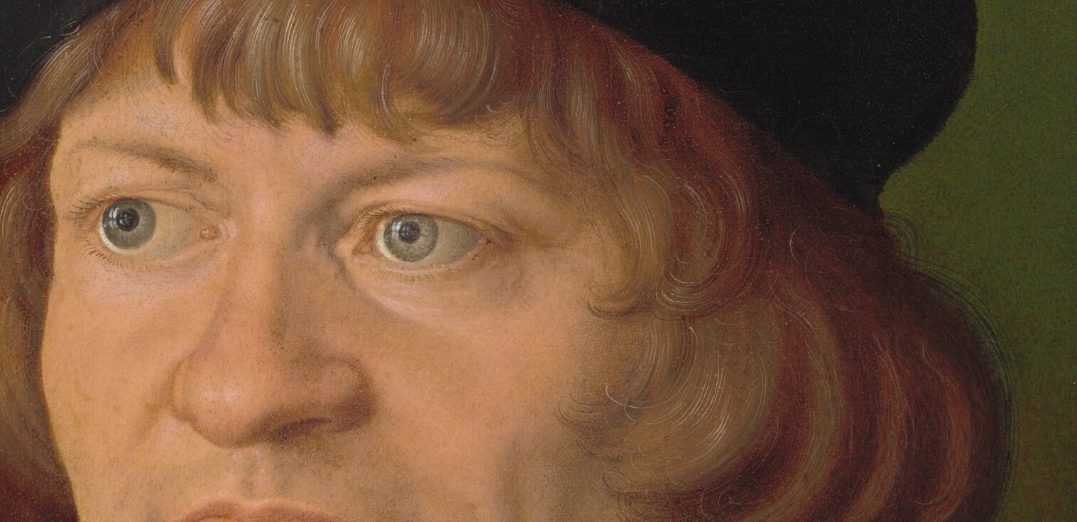 But his eyes tell a different story.