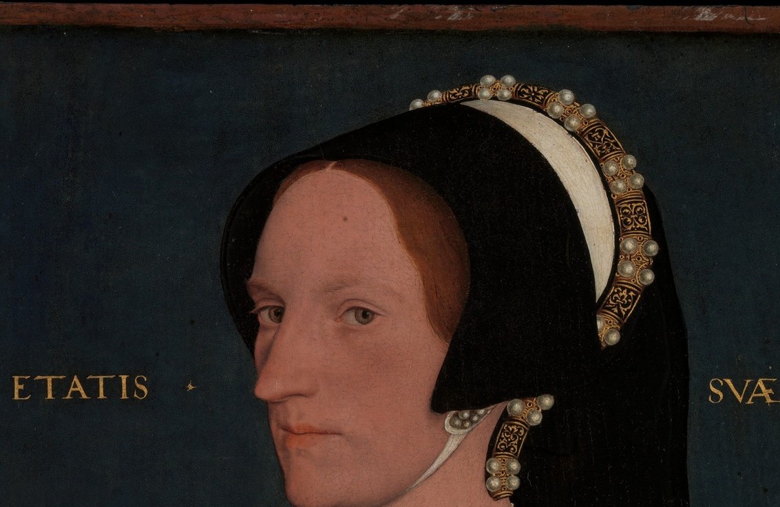 By 1540 gable hoods were already going out of fashion, replaced by the French hood , wearing one here is a statement of conservative, established Englishness and resistance to continental trends