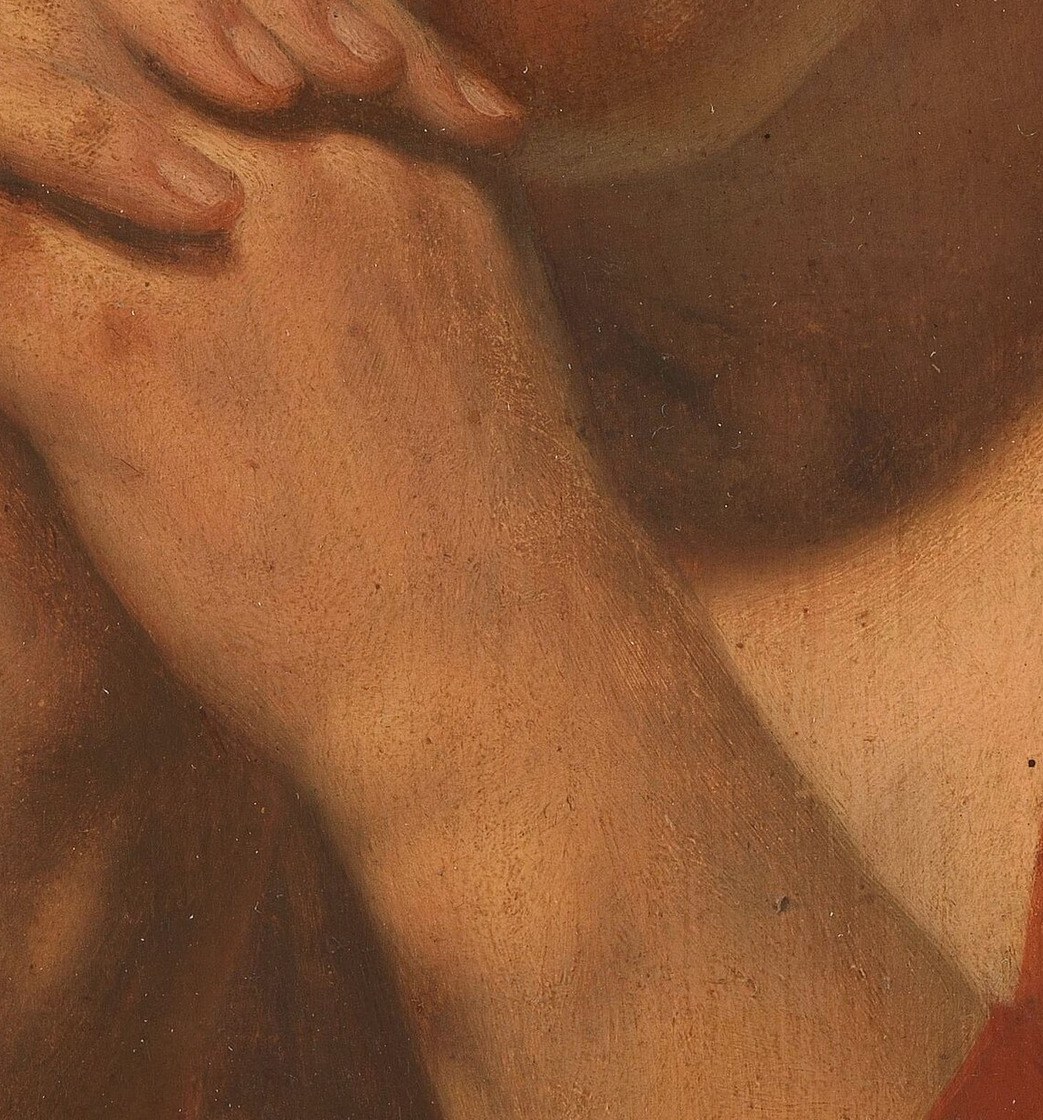 The gesture is the central action, emphasizing piety and a private moment of supplication.