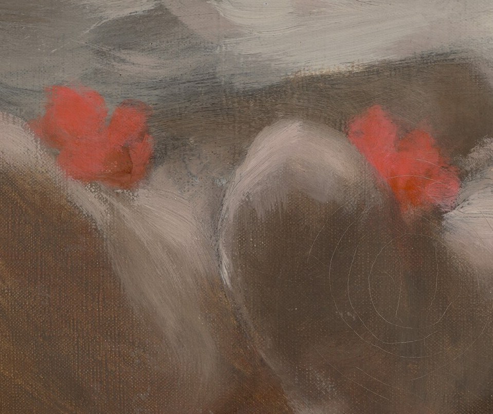 Even his feet are adorned with small red bows.