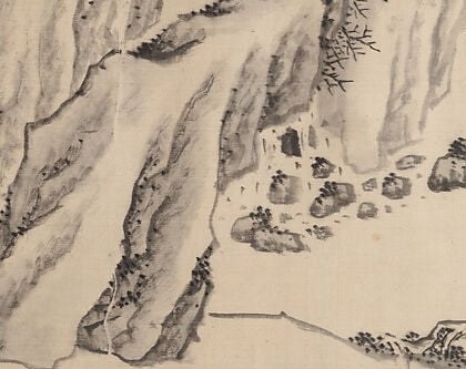 Look at the right cliff face.