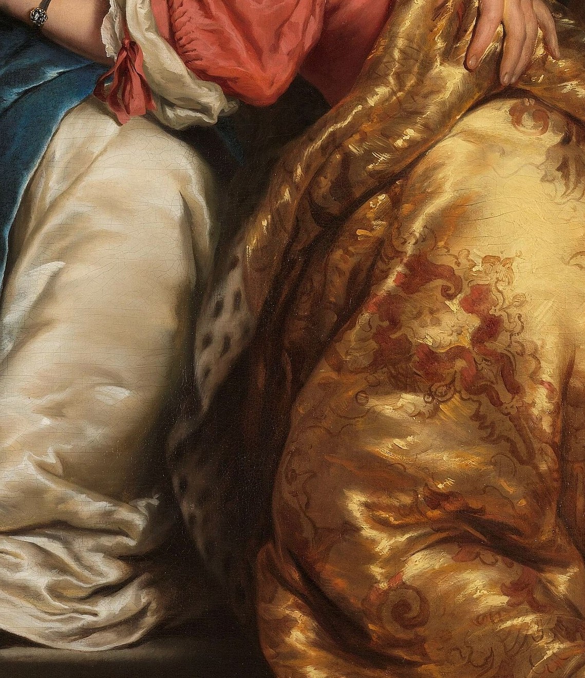 A cherub above holds another book, connecting to higher knowledge.