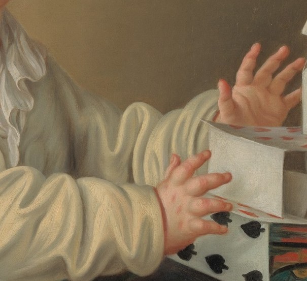 His delicate movements show intense concentration.