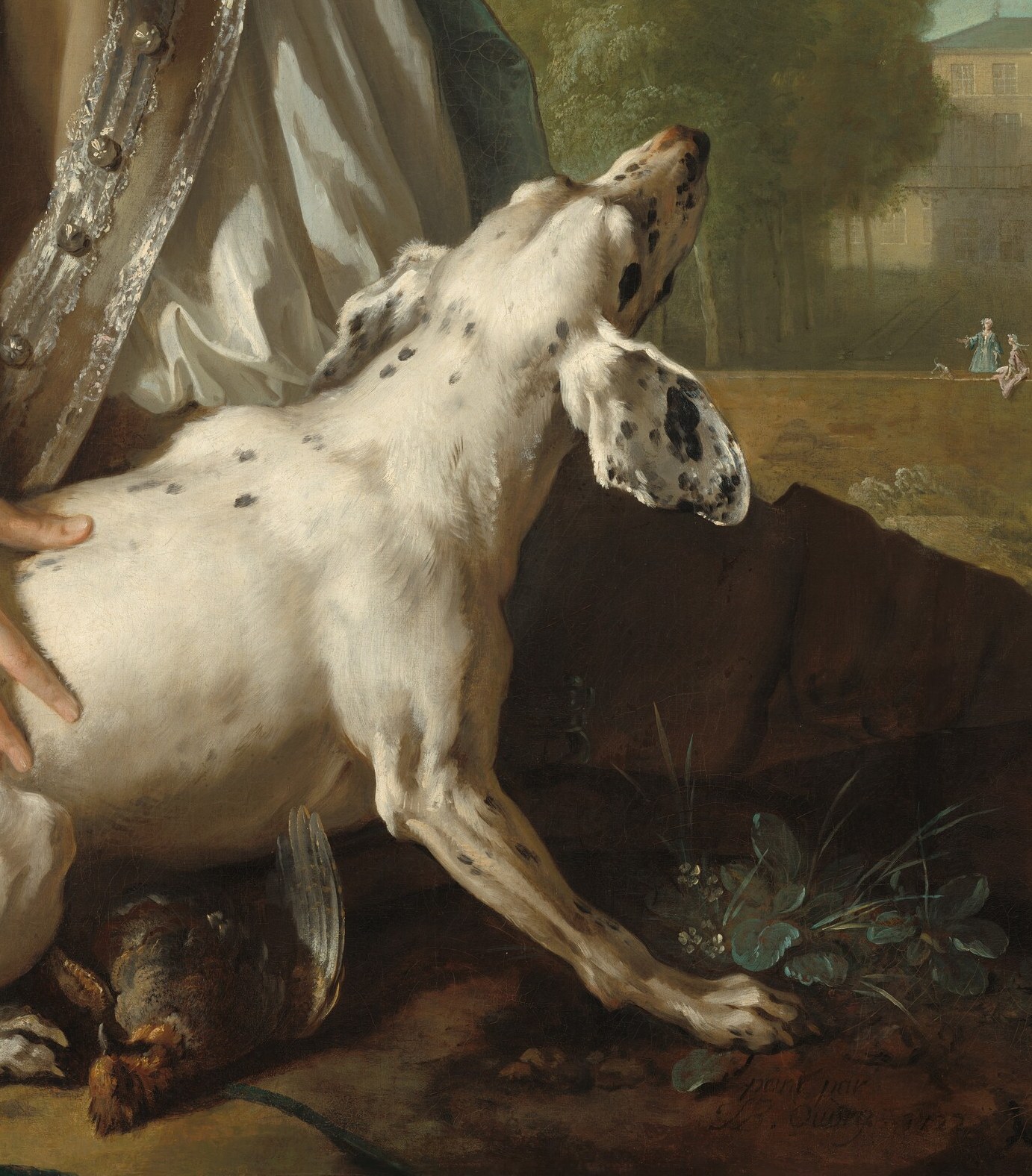 His hunting dog rests calmly at his feet.