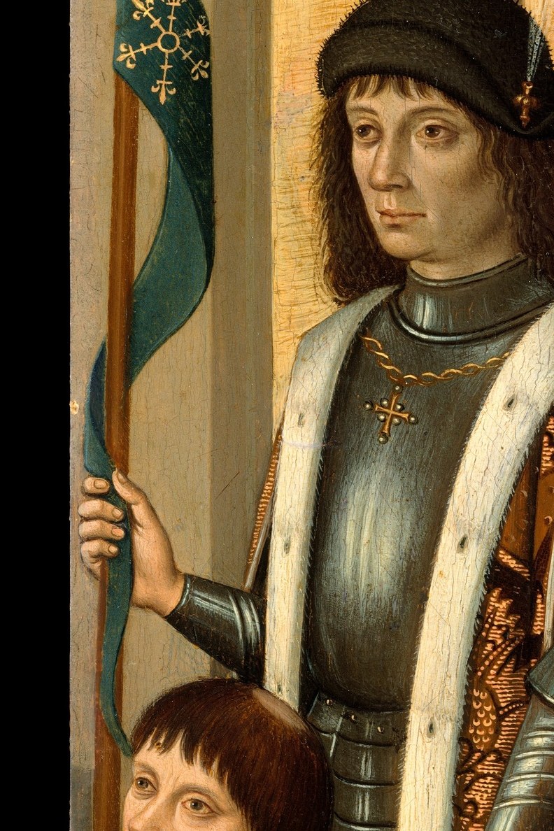 On the right, Saint Victor in polished, contemporary armor.