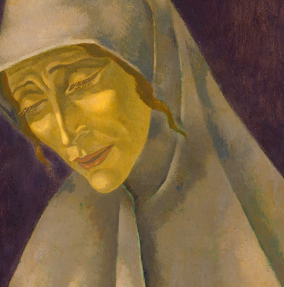 Her face is a study in quiet contemplation.