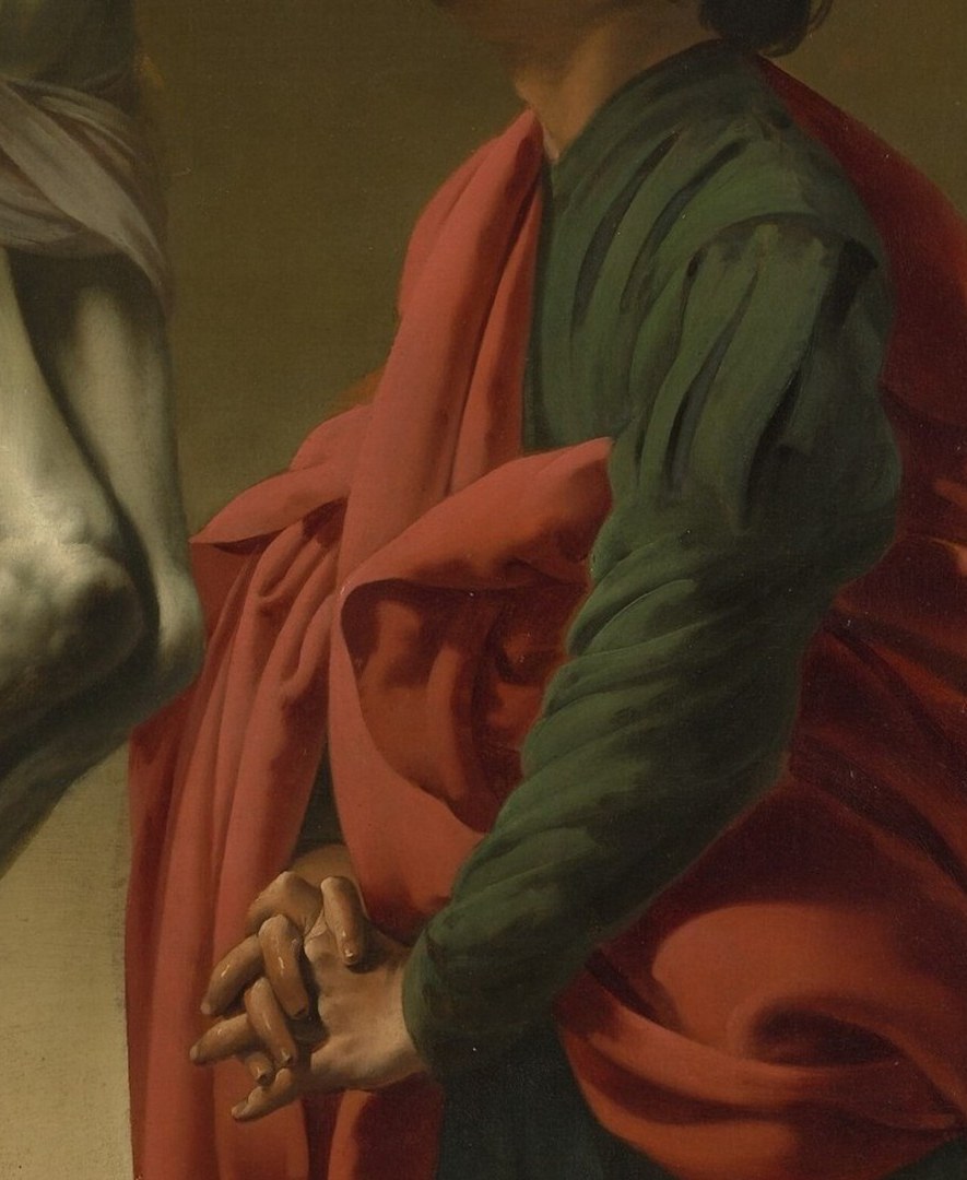 John's face shows raw anguish with open mouth and wide eyes , more extroverted grief than the Virgin, typical of Caravaggist male affect; the two faces together form a study in gendered mourning.