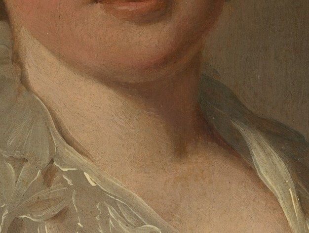 Even her delicate ruffled collar feels alive.