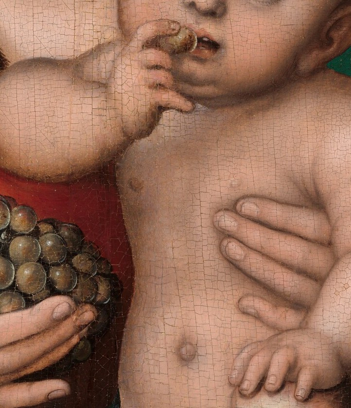The grapes he holds meant his sacrifice.