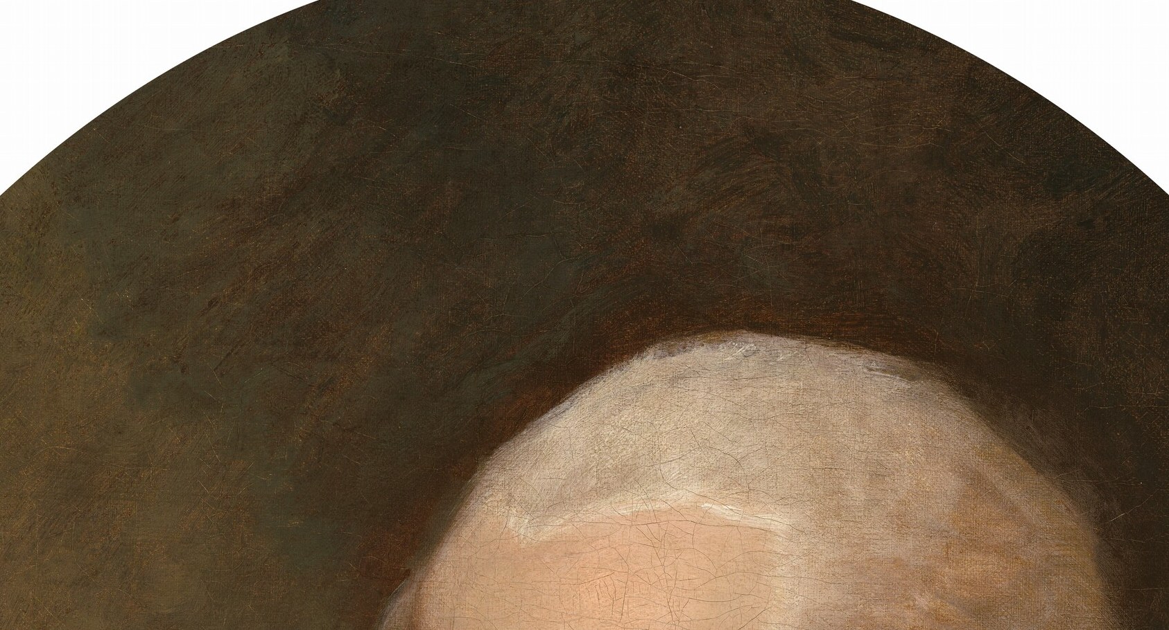 Period-precise status marker that dates the sitter to pre-1800; the white mass frames the face and creates a halo-like contrast against the warm dark background