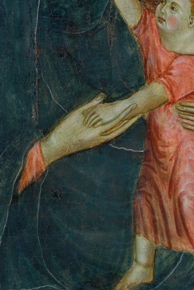 The child gives a blessing. The fingers are a code.