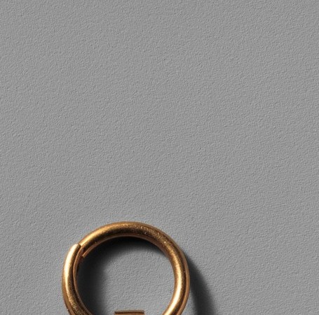 The gold ring means this wasn't framed for a wall.