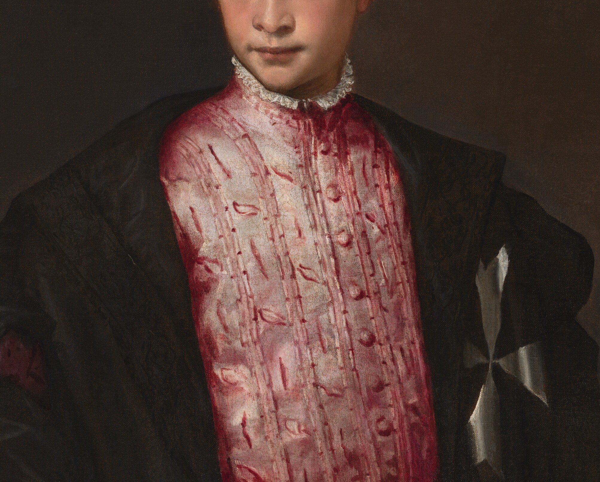 Titian's technical showpiece , the shimmering pink surface with gold thread details suggests luxury fabric without literal transcription; this is paint performing as textile.