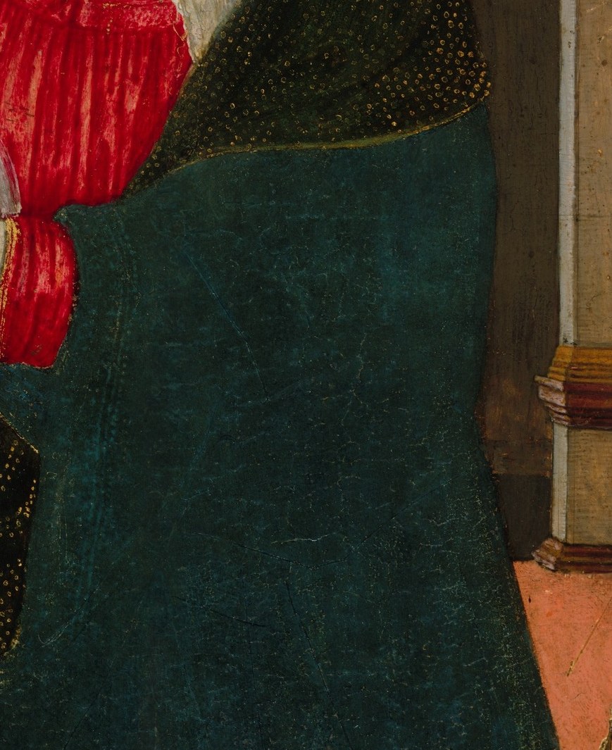 The richly textured, dark mantle contrasts with her inner garments and suggests solemnity.