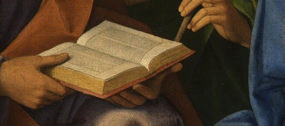 But look closely, there is another figure reading a book.