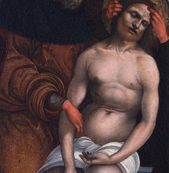 The crown of thorns crowns the pale, downward-tilted head; the contrast between woven thorns and pallid skin anchors the entire emotional weight of the scene.
