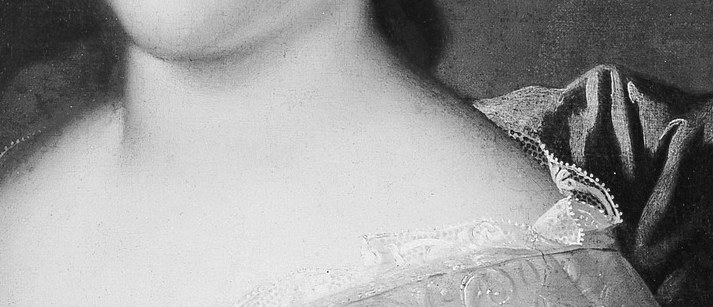 Look at the delicate lace along her neckline.
