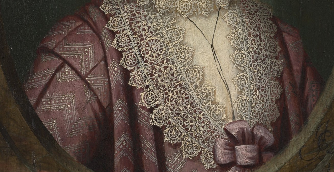 Look at the texture of her pink dress.