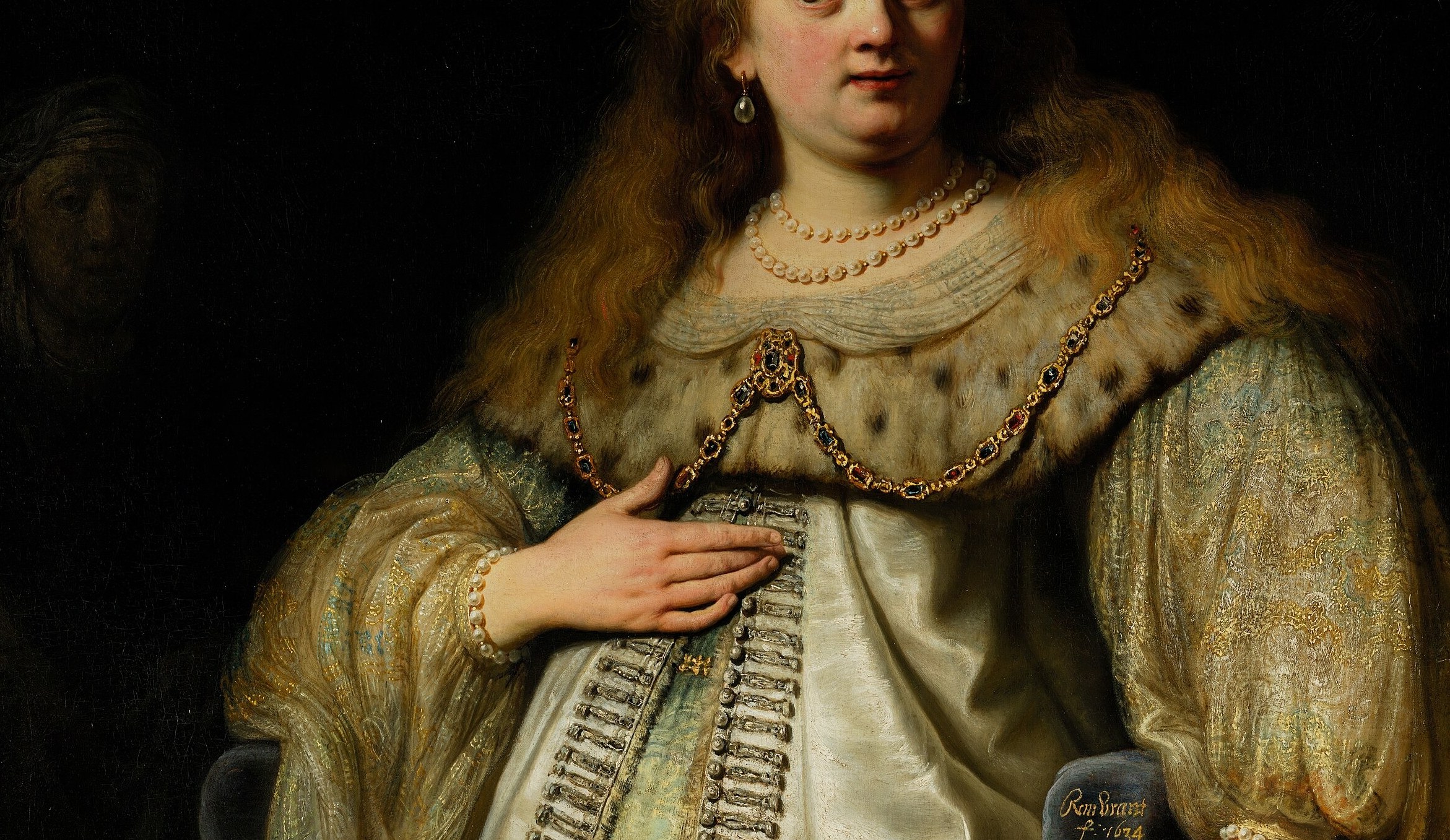 The dense, layered textile passage shows Rembrandt's virtuoso impasto handling of fabric , a trick-lane element where light dies differently in satin vs. fur.