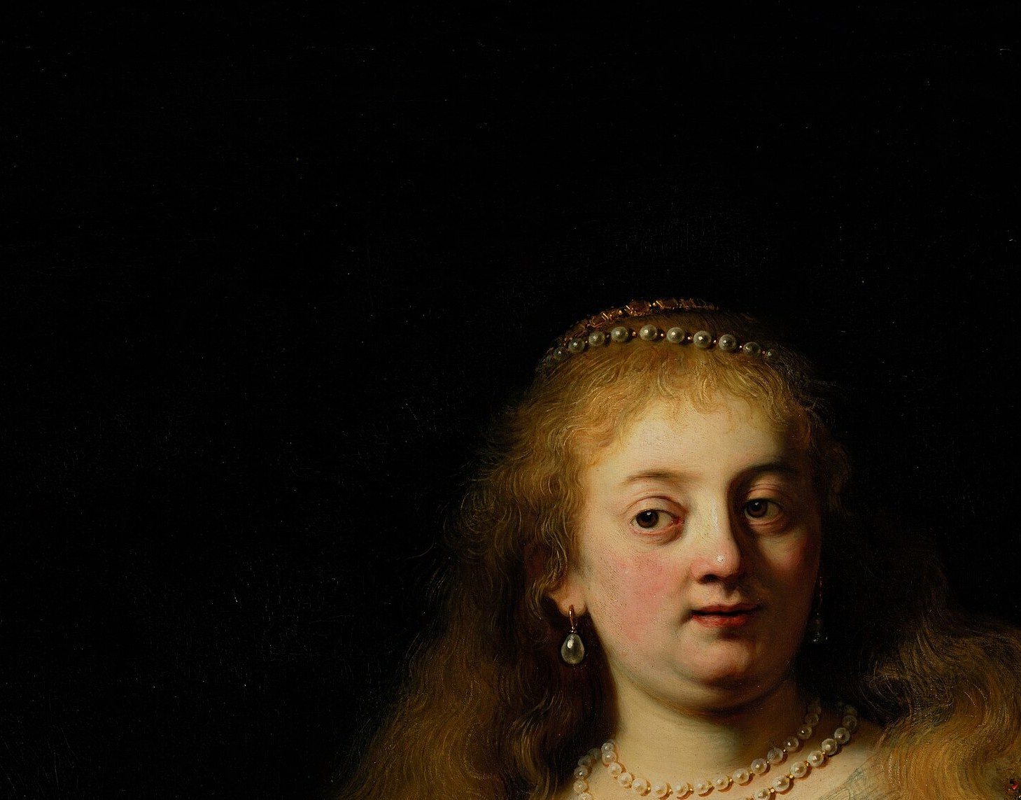 Rembrandt likely used Saskia as model , the expression is suspended between composure and dread, reading as either seduction or suppressed guilt depending on the viewer's knowledge of the story.