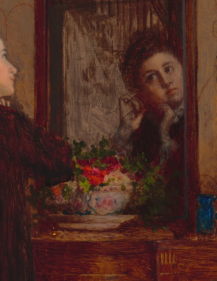 Notice her reflection, slightly different, in the mirror.
