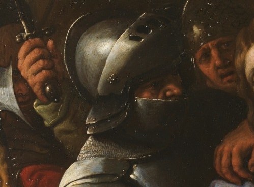 The polished metal reflects the scene, adding a layer of visual complexity and hinting at the impending conflict.