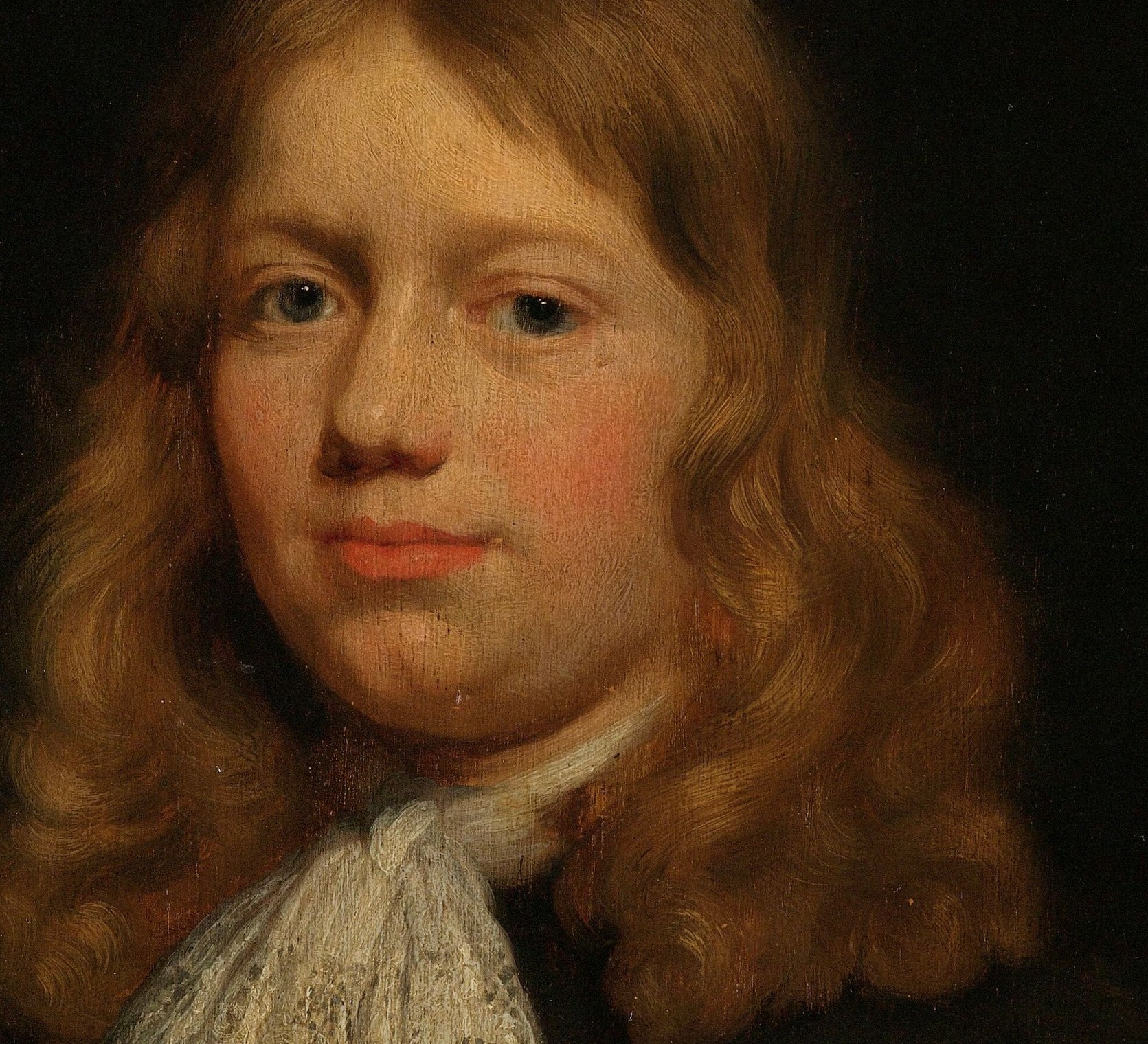 The soft, flowing curls and warm color add to the sitter's youthful and perhaps gentle appearance.