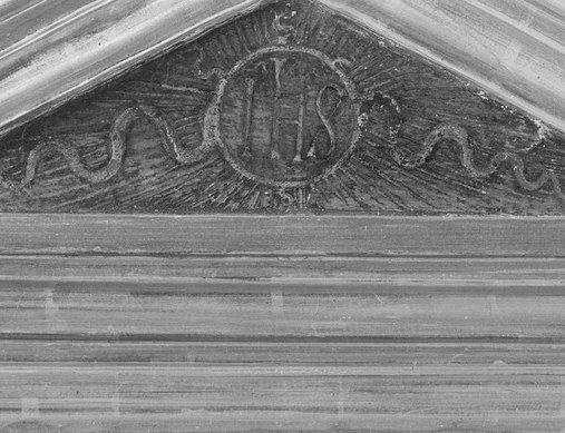 The Madonna's halo is not just gold leaf. It is punched, tooled, worked like jewelry.