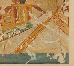 Now check the prow of that same boat, the very end of the scene.