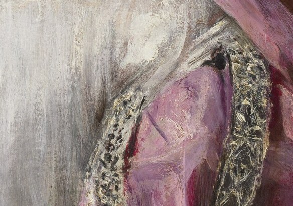 A pink sash adds a touch of color.