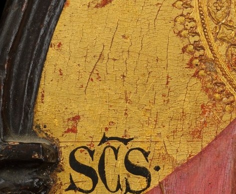 Look above his head. The inscription names him.