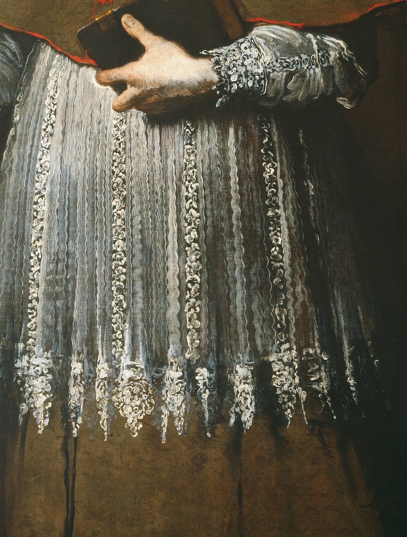 See how his delicate robe shows through the cloak.