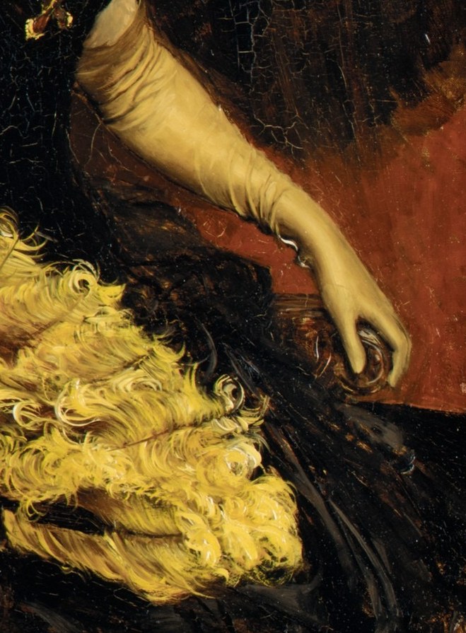 The voluminous yellow fan adds a dramatic, theatrical flourish.