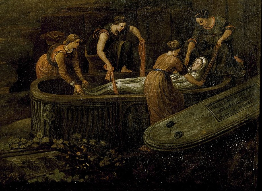 The inscription on the sarcophagus lid names Saint Serapia.