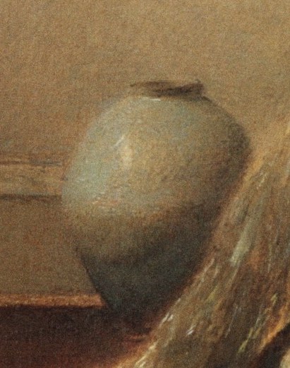 Its muted tones and rounded form provide a grounding element in the composition.