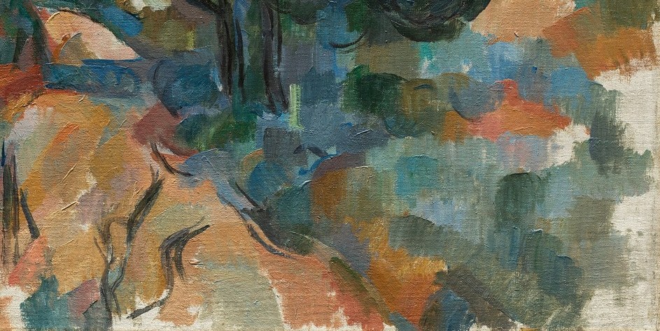 The warm, earthy tones provide a strong contrast to the cooler blues and greens of the landscape.