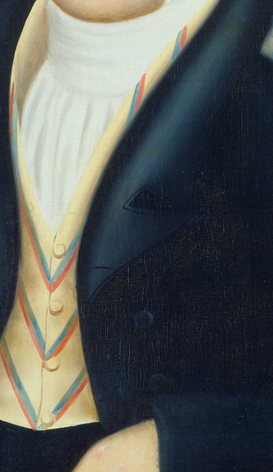 Notice how the light catches the diagonals of his striped vest.
