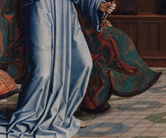 But look closely, there is a hidden message on his robe.