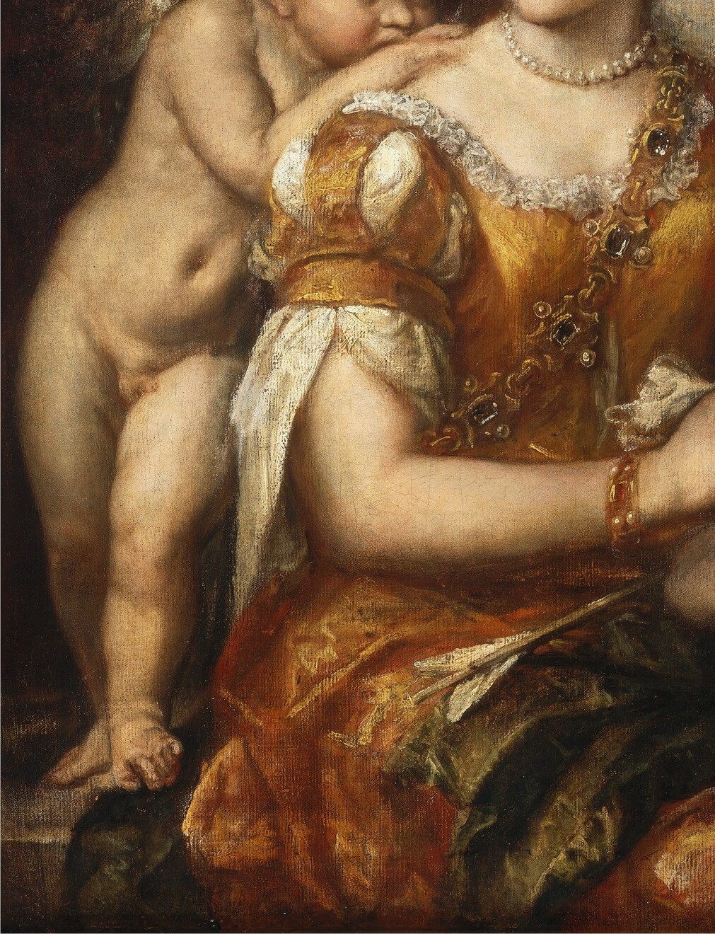 Venetian workshop virtuosity on display: the slashed and puffed sleeves in warm gold demonstrate the studio's command of sumptuous textile painting, the commercial signature of Titian's circle.