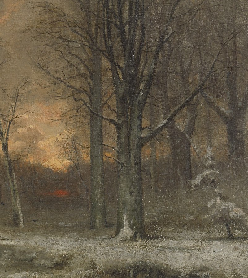 Its stark branches create a dramatic silhouette against the sky, conveying the harshness of winter.