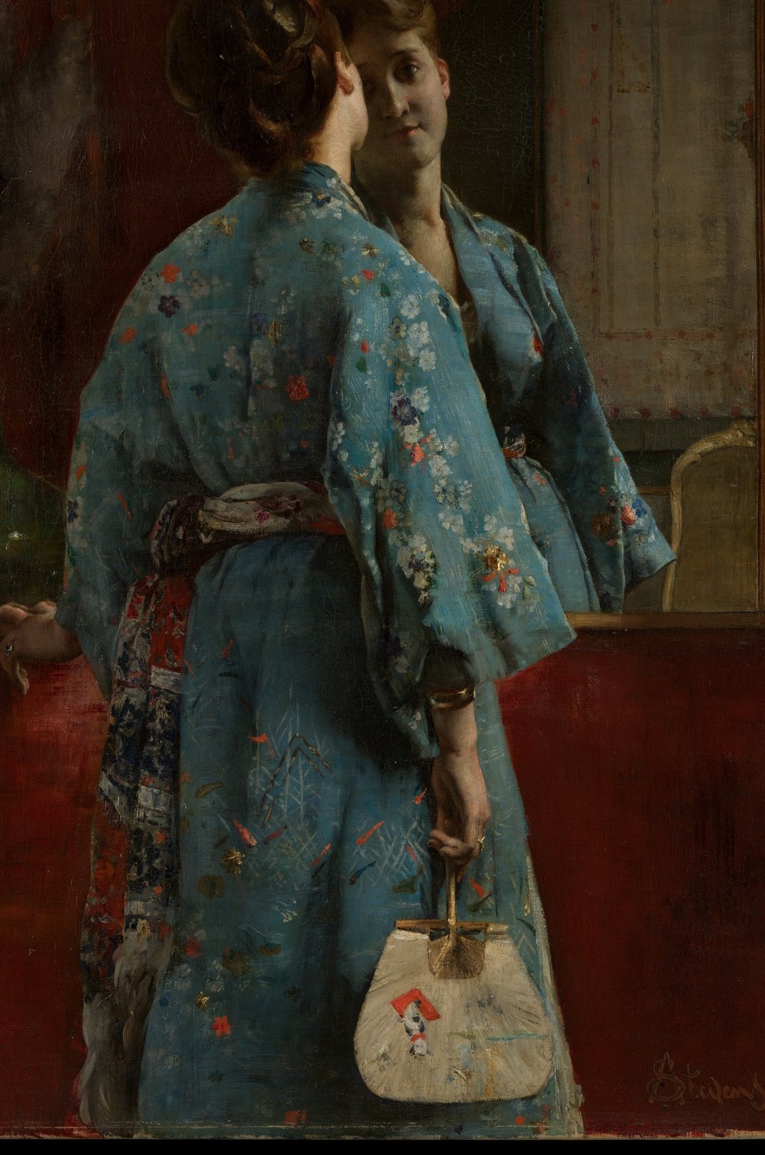 She wears a Japanese robe, a sign of its time.