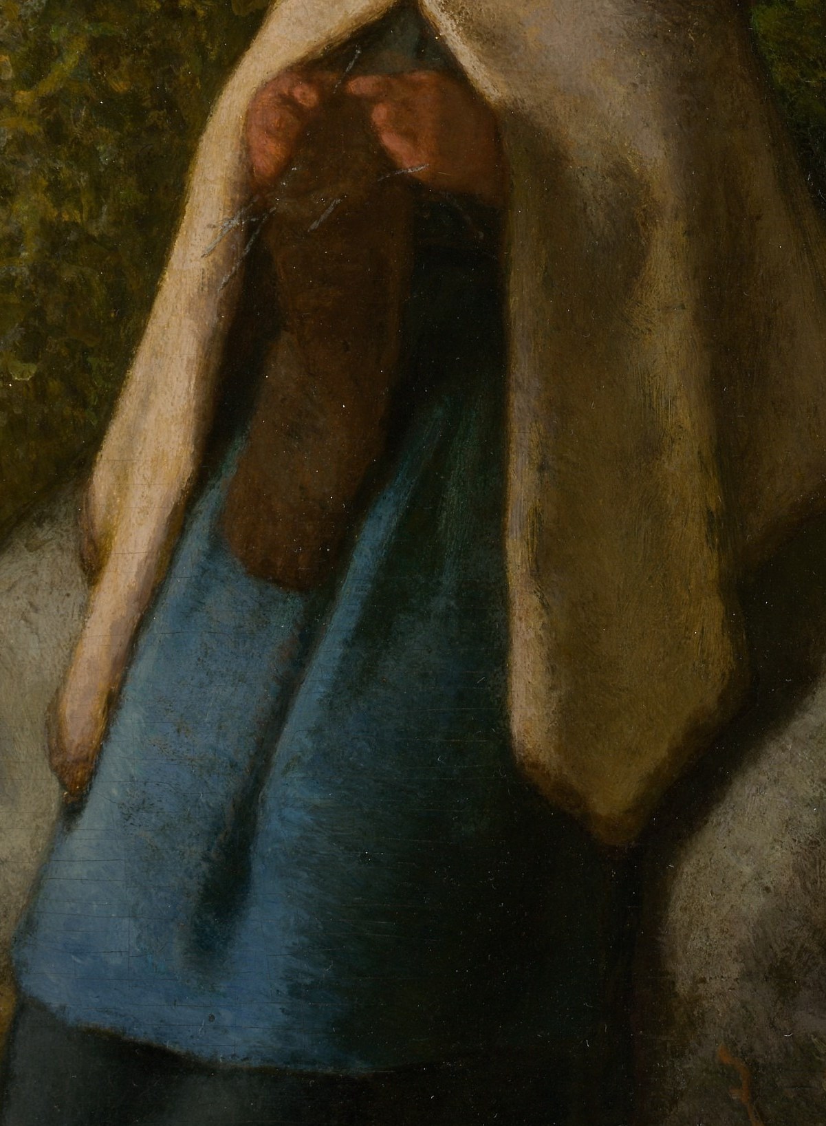 The voluminous cloak drapes around her, offering a sense of protection and isolation.