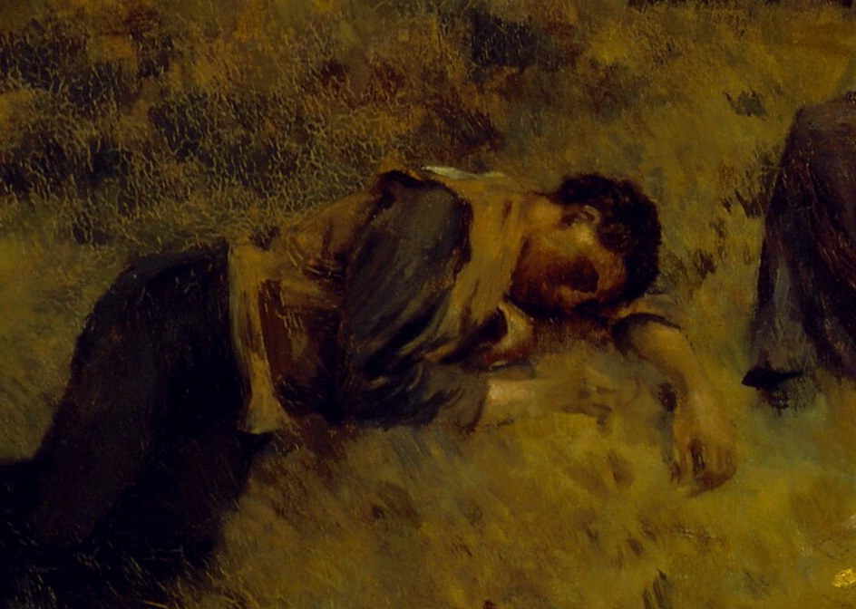 Another child, too exhausted to go on, lies in the grass.