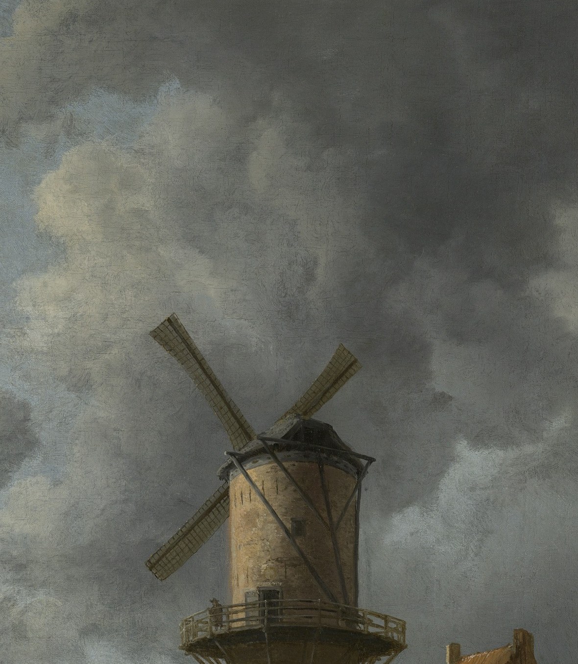 Here, a windmill dominates the sky like a cathedral.