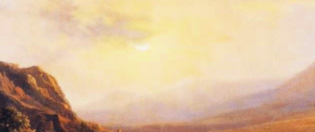 See how the light glows behind the mountains.