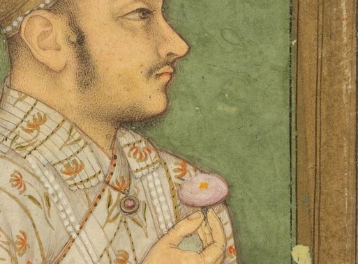 Subtle gold leaf details add to the opulence of his attire.