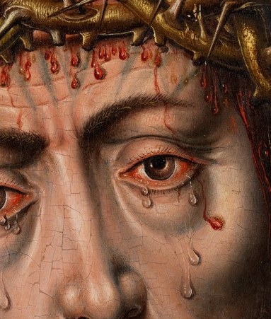 The tears are not just painted. They are built with light.